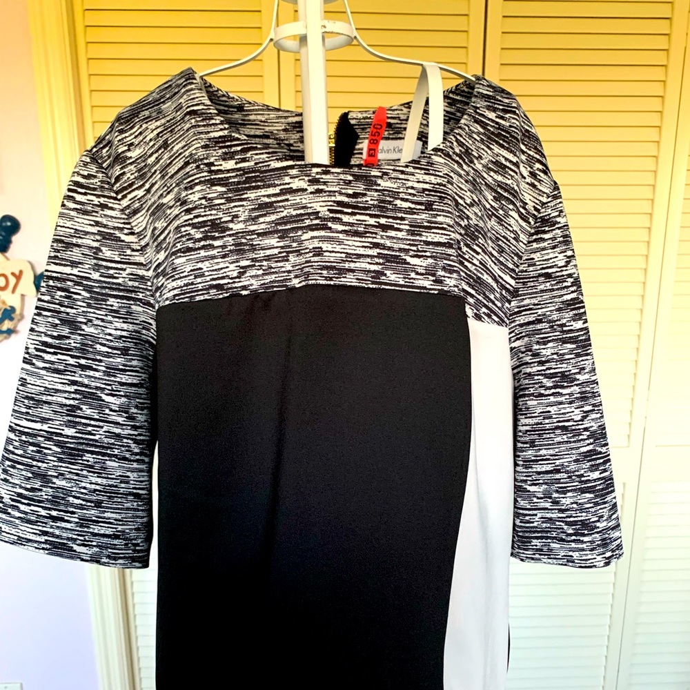 A nice top by Calvin Klein to be paired with a skirt or pants